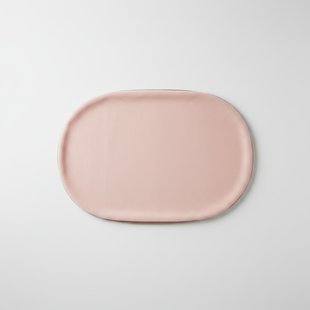 Top-down view of oval pet sleeping mat showing full oval shape and plush texture
