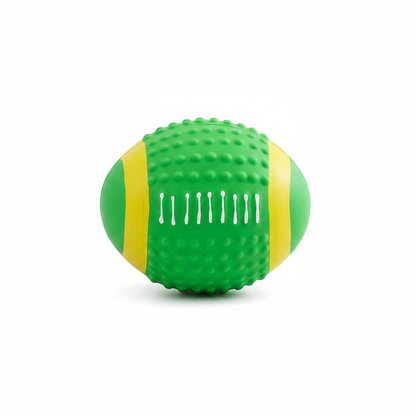 Rugby ball shaped rubber dog toy in green with yellow stripe bands and bumpy texture