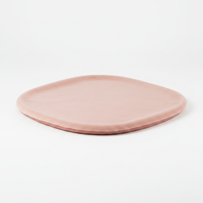 Oval flat pet sleeping mat in blush pink short plush fleece